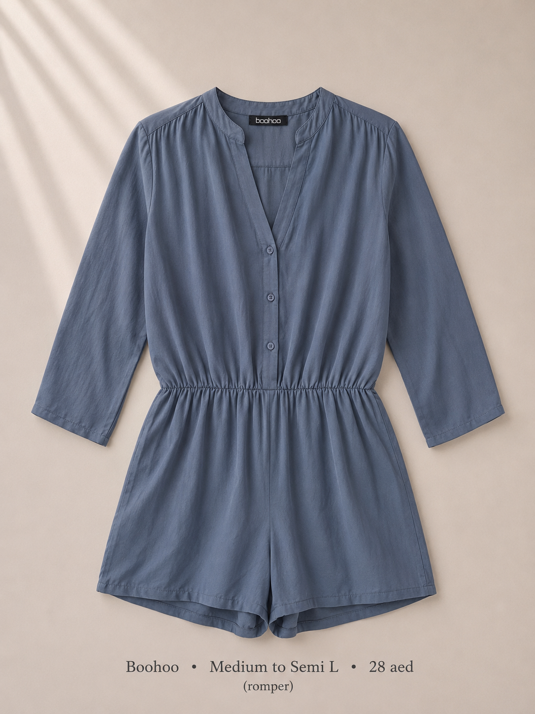 Boohoo slate blue button-down romper with 3/4 sleeves, size Medium to Semi L