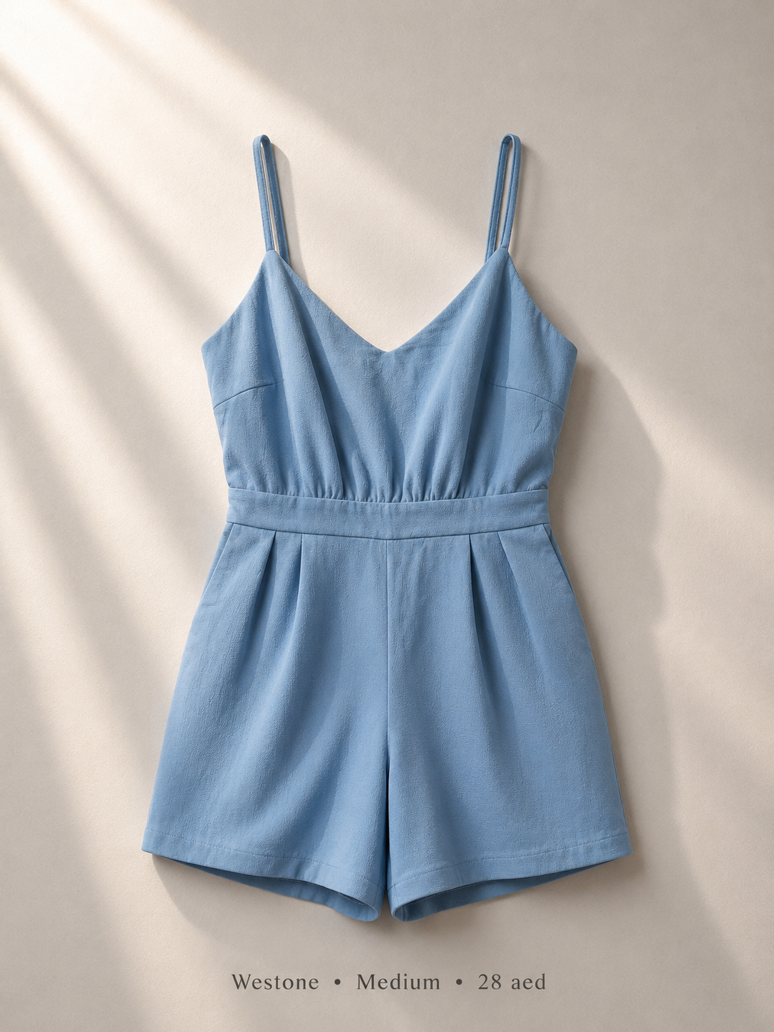 Westone powder blue V-neck cami romper with double spaghetti straps and pleated shorts, size Medium