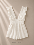 White ruffle flutter-sleeve romper with deep plunge V-neck and smocked waist, size Medium