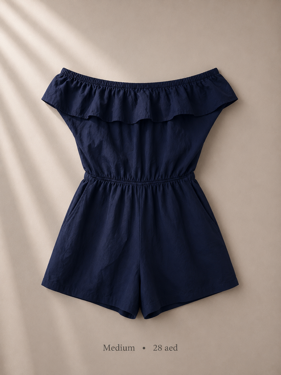 Navy off-shoulder double ruffle romper with elasticated waist, size Medium