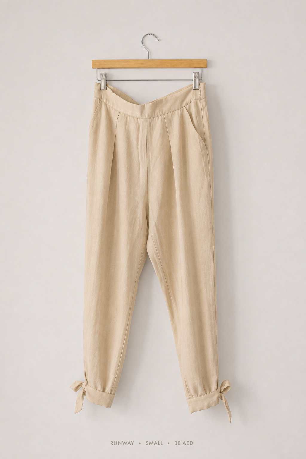 Runway Tie-Cuff Tapered Trousers – Small, sand beige with V-waist and self-tie bow cuffs