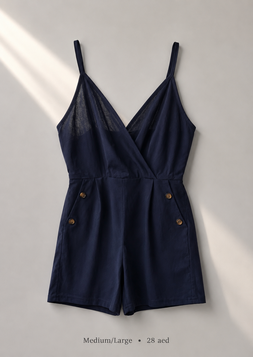 Navy wrap cami romper with gold-tone button detail, size Medium/Large