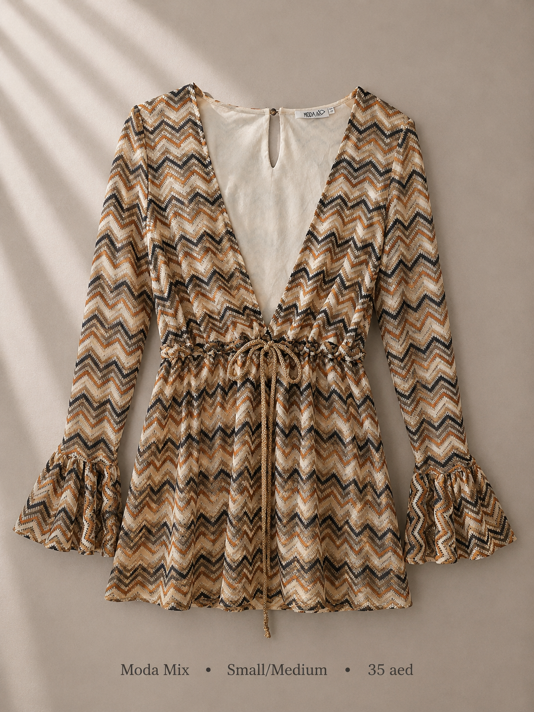 Moda Mix earth-tone chevron long-sleeve romper with ruffle bell cuffs and drawstring waist, size Small/Medium