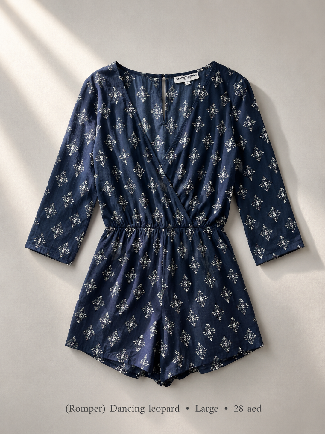 Dancing Leopard navy geometric medallion print wrap romper with 3/4 sleeves, size Large
