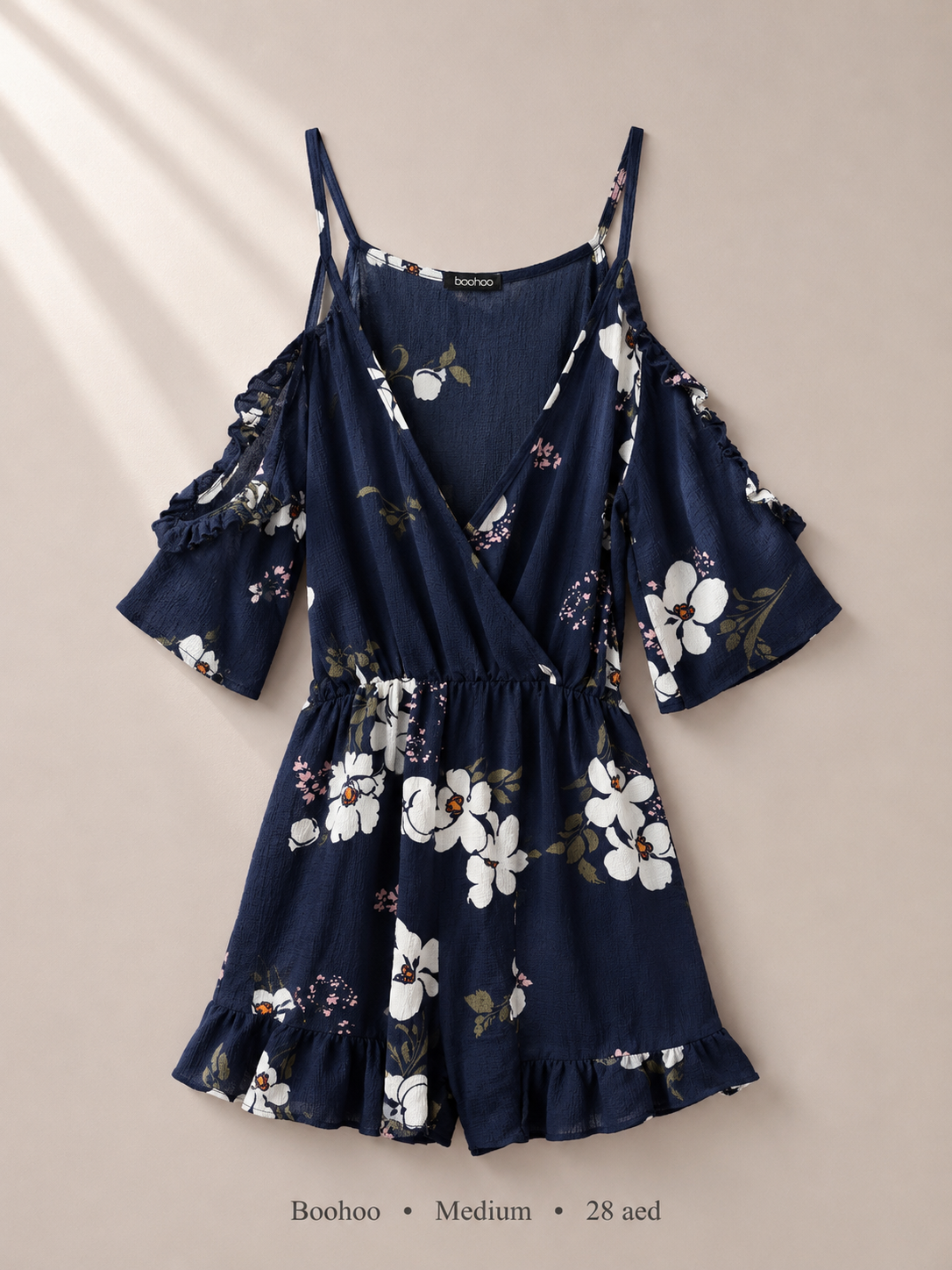 Boohoo navy floral cold-shoulder romper with ruffle sleeves, size Medium