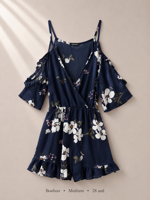 Boohoo navy floral cold-shoulder romper with ruffle sleeves, size Medium