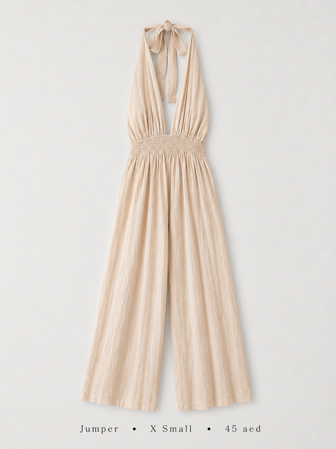 Deep V Halter Smocked Waist Wide-Leg Jumpsuit in Cream