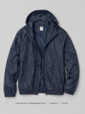 Anko Lightweight Hooded Windbreaker – Medium, deep navy with attached hood and slash pockets