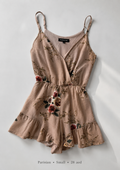 Parisian blush pink floral wrap cami romper with ruffled hem, size Small