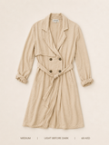 Light Before Dark Double-Breasted Belted Trench Coat – Medium, soft sand with draped lapel and self-tie belt