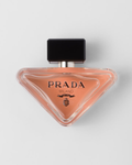 Prada Milano perfume in a pink triangular bottle